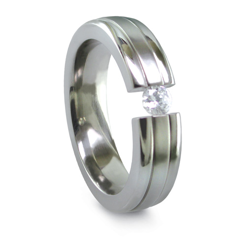 Contoured Titanium Ring with Tension Set Diamond by Edward Mirell
