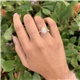 Luminous Two Tone Pear Shaped Diamond Cluster Engagement Ring 