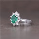 Oval Emerald and Diamond Ballerina Style Ring